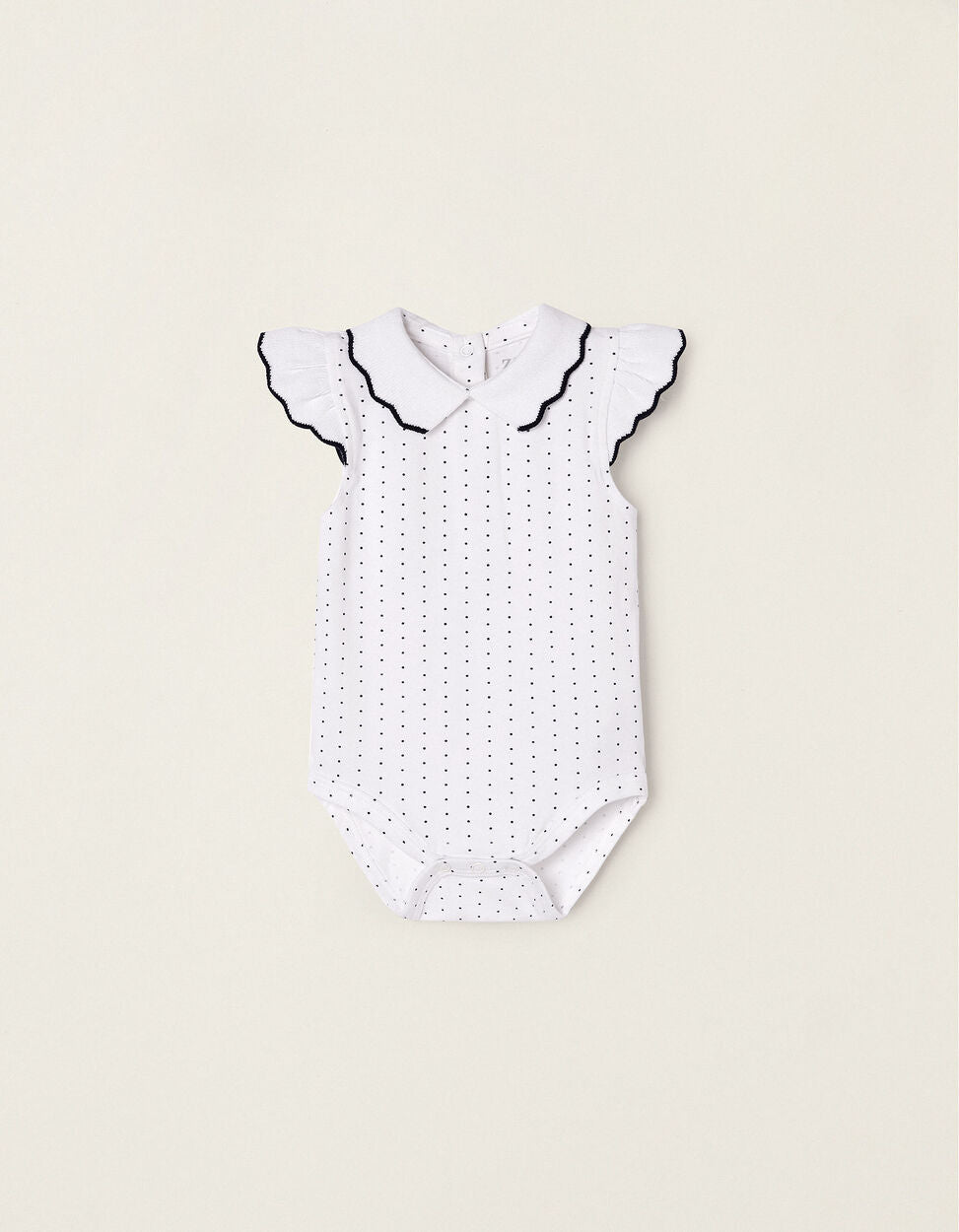 Body con inserti in filo di cotone per neonata